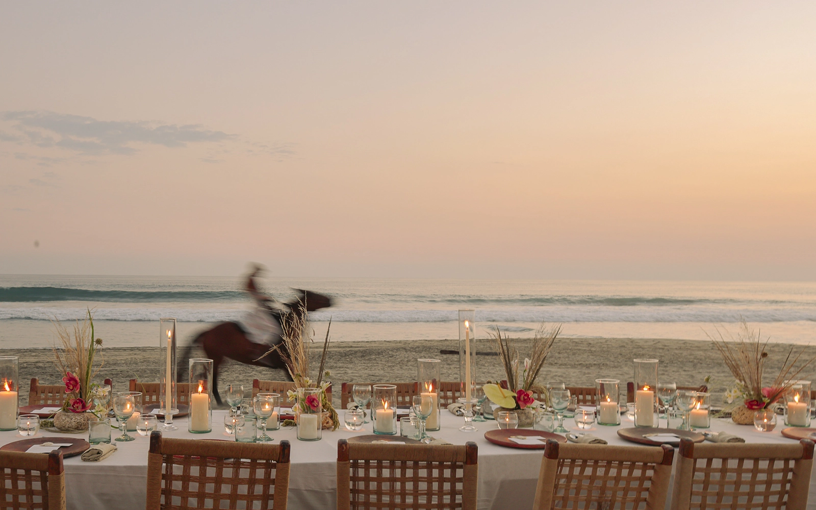 Beach wedding setting at sunset at Casa Yuma, Puerto Escondido