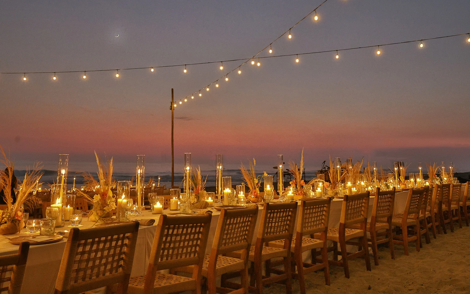 Sunset cocktail reception by the pool and firepit at Casa Yuma