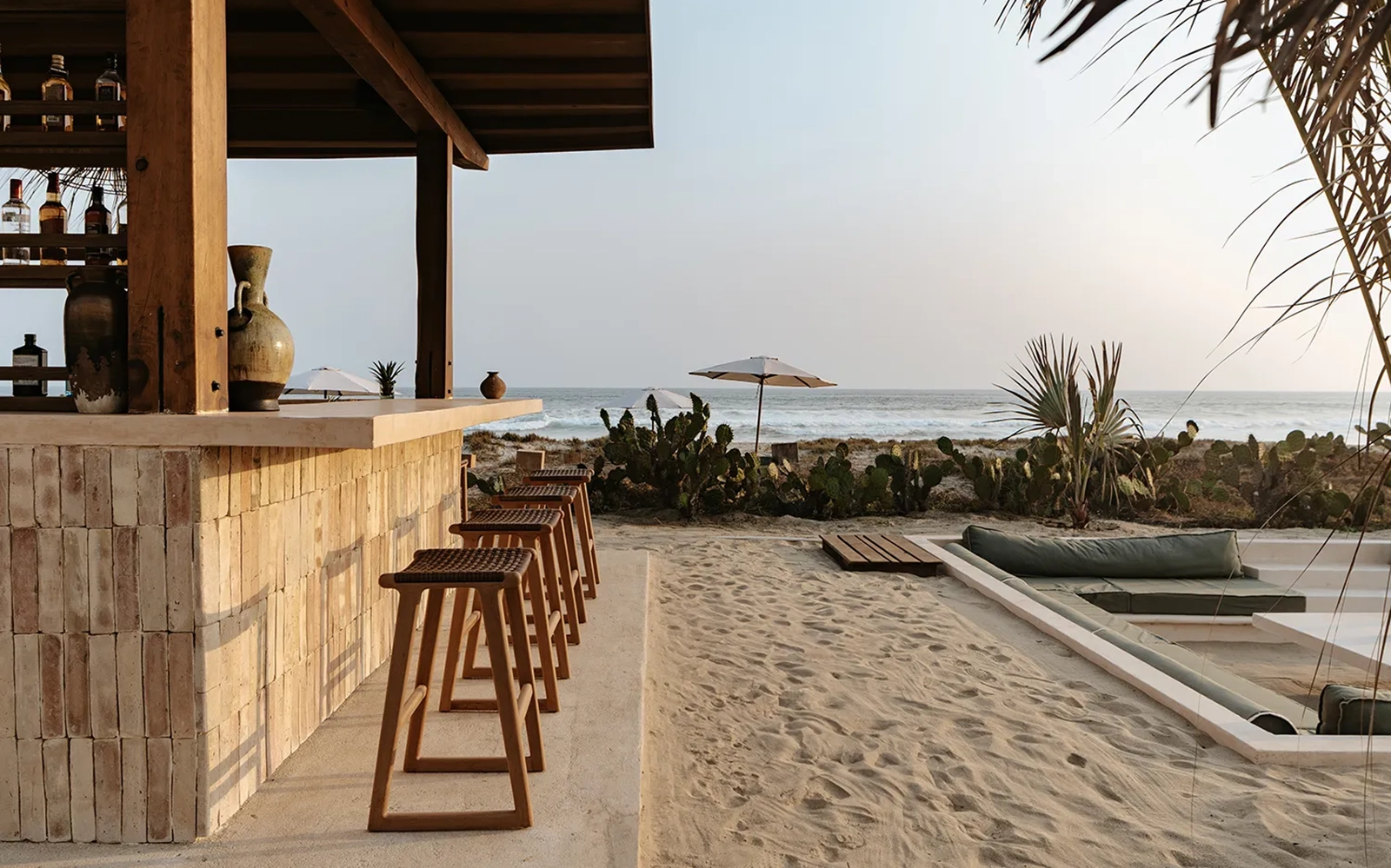 Beachfront spa cabin surrounded by vegetation at Casa Yuma